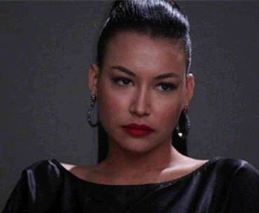 Afro-Latina actress Naya Rivera as Santana Lopez in Glee shakes her head